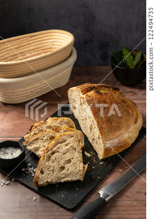 Sourdough homemade bread sliced loaf rustic round craft bread Sourdough homemade bread sliced loaf rustic round craft bread 122494735