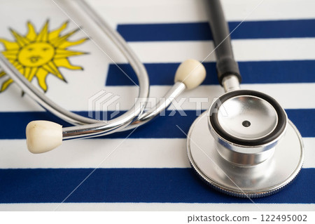 Uruguay flag with black stethoscope, Business and finance concept. 122495002