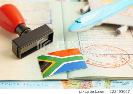 South Africa passport with approved stamp on document for tourism to immigration at airport in country. 122495067