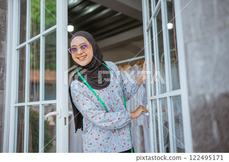 Fashion Designer Opening New Doors to Endless Creativity in a Modern Atelier 122495171