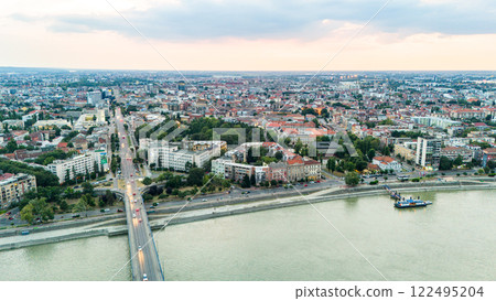 Aerial view of Novi Sad Serbia with city streets Danube river and urban skyline Aerial view of Novi Sad Serbia with city streets Danube river and urban skyline 122495204