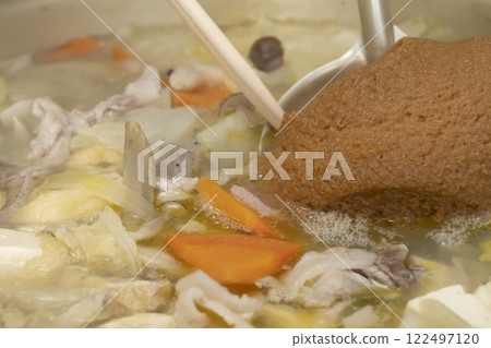 The process of making pork soup. Pork soup with lots of ingredients. 122497120