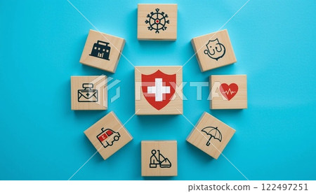 Health Insurance and Medical Care Concept with Wooden Blocks and Healthcare Icons on Blue Background. Health Insurance and Medical Care Concept with Wooden Blocks and Healthcare Icons on Blue Background. 122497251