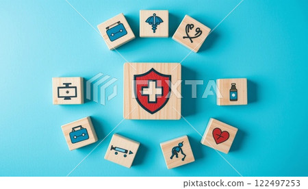 Health Insurance and Medical Care Concept with Wooden Blocks and Healthcare Icons on Blue Background. Health Insurance and Medical Care Concept with Wooden Blocks and Healthcare Icons on Blue Background. 122497253