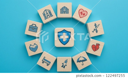 Health Insurance and Medical Care Concept with Wooden Blocks and Healthcare Icons on Blue Background. Health Insurance and Medical Care Concept with Wooden Blocks and Healthcare Icons on Blue Background. 122497255