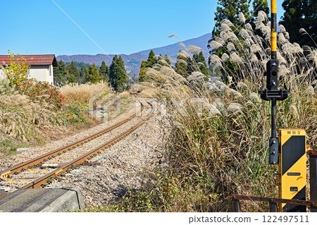 Railway tracks leading to mountainous areas 122497511