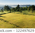 Viewpoint of sunrise with fog in the valley, green field and green trees in the morning, the Northern of Thailand 122497629