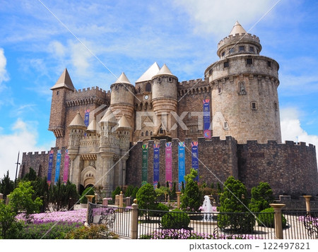 Colorful castle and gardens at the top of Ba Na Hills theme park in Da Nang Colorful castle and gardens at the top of Ba Na Hills theme park in Da Nang 122497821