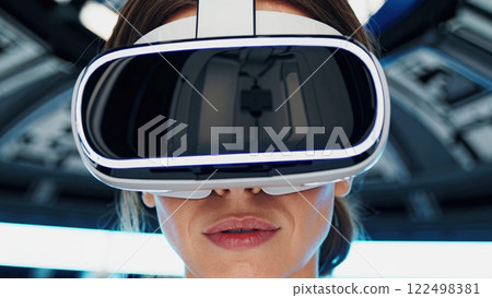 Engaging Futuristic Virtual Reality Experience With Advanced Headset Technology in a Sleek Environment 122498381