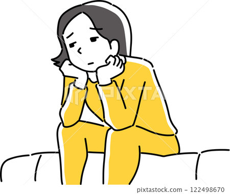 A worried woman sitting on the sofa A worried woman sitting on the sofa 122498670