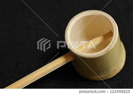 A small ladle made from bamboo A small ladle made from bamboo 122498820