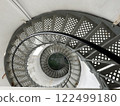 Round and round, the lighthouse's spiral staircase 122499180