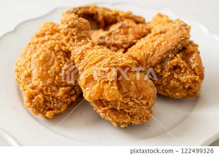 fried chicken with ketchup on plate fried chicken with ketchup on plate 122499326