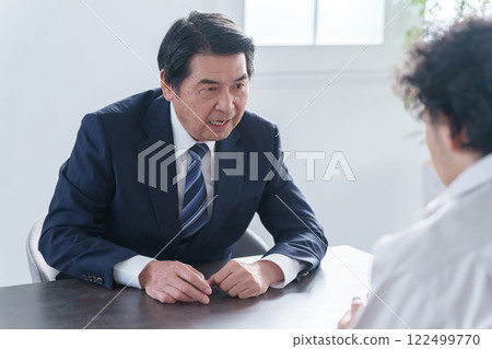 Angry businessman and man 122499770