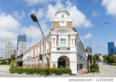Building view of the Jinrikisha Station in Chinatown, Singapore. Formerly the main station for rickshaws, now it has been renovated into a shopping and recreational center. Building view of the Jinrikisha Station in Chinatown, Singapore. Formerly the main station for rickshaws, now it has been renovated into a shopping and recreational center. 122501469