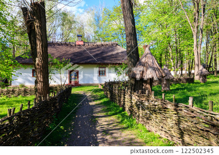 Ancient traditional ukrainian rural house in Open air Museum of Folk Architecture and Folkways of Middle Naddnipryanschina in Pereyaslav, Ukraine Ancient traditional ukrainian rural house in Open air Museum of Folk Architecture and Folkways of Middle Naddnipryanschina in Pereyaslav, Ukraine 122502345