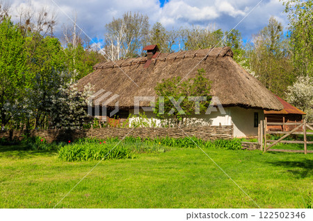 Ancient traditional ukrainian rural house in Open air Museum of Folk Architecture and Folkways of Middle Naddnipryanschina in Pereyaslav, Ukraine Ancient traditional ukrainian rural house in Open air Museum of Folk Architecture and Folkways of Middle Naddnipryanschina in Pereyaslav, Ukraine 122502346