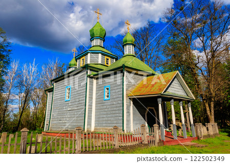 Old wooden church in Open air Museum of Folk Architecture and Folkways of Middle Naddnipryanschina in Pereyaslav, Ukraine 122502349