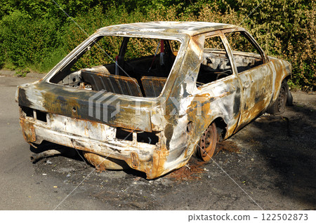 Burnt car wreck Burnt car wreck 122502873