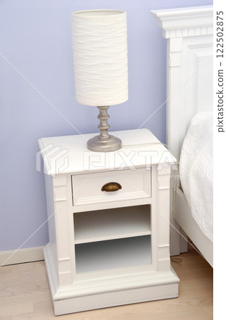 Bedside table with lamp 122502875