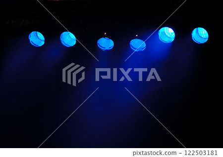 Blue spotlights and smoke 122503181