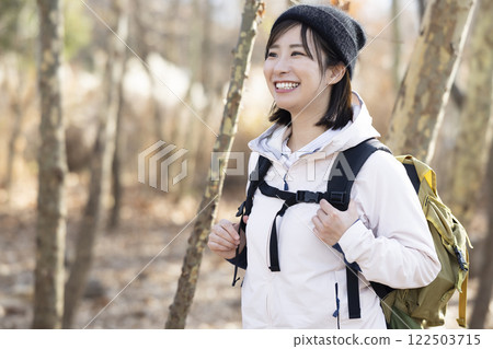 Woman enjoying hiking 122503715