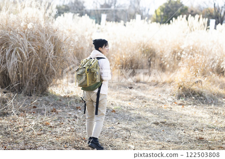 Woman enjoying hiking Woman enjoying hiking 122503808