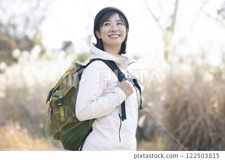 Woman enjoying hiking 122503815