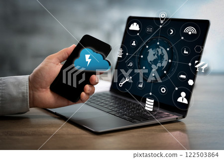 electric powre IndustryEnergy and Smart Grid Technology cloud with CO2 on it. A tablet with a blue screen electric powre IndustryEnergy and Smart Grid Technology cloud with CO2 on it. A tablet with a blue screen 122503864