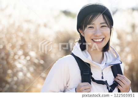 Woman enjoying hiking 122503951