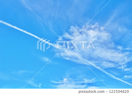 Airplane cloud in the blue sky 122504820