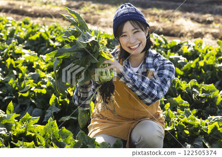Scene of a woman working in the fields Scene of a woman working in the fields 122505374