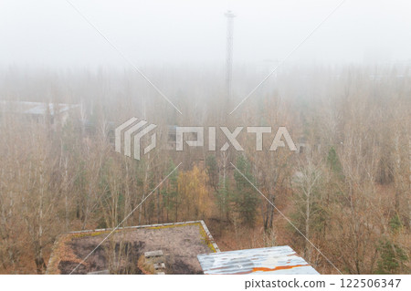 View of ghost town Pripyat at autumn in Chernobyl Exclusion Zone, Ukraine. View from above View of ghost town Pripyat at autumn in Chernobyl Exclusion Zone, Ukraine. View from above 122506347