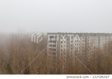 View of ghost town Pripyat at autumn in Chernobyl Exclusion Zone, Ukraine. View from above View of ghost town Pripyat at autumn in Chernobyl Exclusion Zone, Ukraine. View from above 122506387