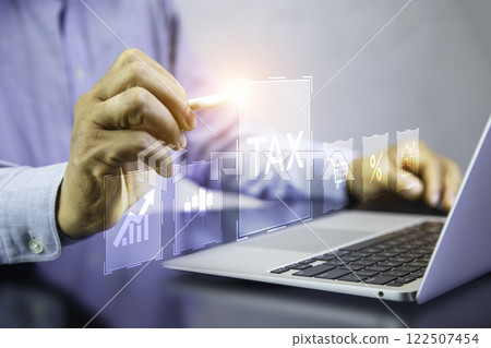 Paying Tax Online, Annual Tax, Businessman pointing to tax icon and there are spending icons around it instead, investment returns, income, retirement Compensation fund, investment, dividend. Paying Tax Online, Annual Tax, Businessman pointing to tax icon and there are spending icons around it instead, investment returns, income, retirement Compensation fund, investment, dividend. 122507454