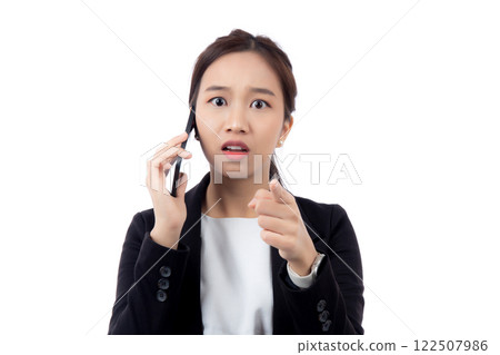 Portrait young asian businesswoman talking and shout with annoyed calling on smart phone isolated. Portrait young asian businesswoman talking and shout with annoyed calling on smart phone isolated. 122507986