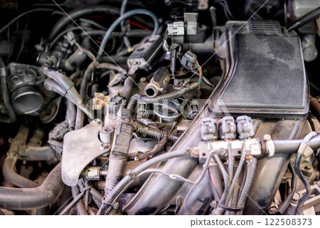 Car mechanic drain the old lubricant engine oil Car mechanic drain the old lubricant engine oil 122508373