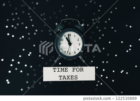 Black and white photo of a clock with the words Time for Taxes 122510889