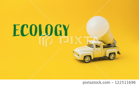 White truck with a light bulb on top of it White truck with a light bulb on top of it 122511696