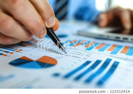 Financial Discussion in Modern Office Setting: Professional Client Meeting on Trends and Analysis 122512414