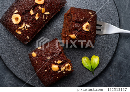 Delicious brownies with an adult image 122513137