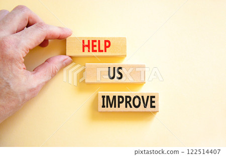 Help us improve symbol. Concept words Help us improve on beautiful wooden blocks. Beautiful white background. Businessman hand. Business motivational help us improve concept. Copy space. Help us improve symbol. Concept words Help us improve on beautiful wooden blocks. Beautiful white background. Businessman hand. Business motivational help us improve concept. Copy space. 122514407
