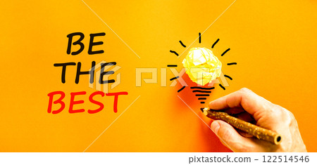Motivational be the best symbol. Concept words Be the best on beautiful orange paper. Beautiful orange background. Businessman hand. Light bulb. Business motivational be the best concept. Copy space. Motivational be the best symbol. Concept words Be the best on beautiful orange paper. Beautiful orange background. Businessman hand. Light bulb. Business motivational be the best concept. Copy space. 122514546