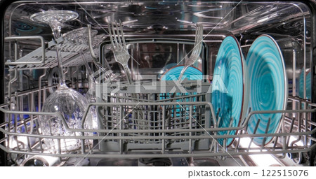Open dishwasher with clean dishes Housekeeping concept Open dishwasher with clean dishes Housekeeping concept 122515076