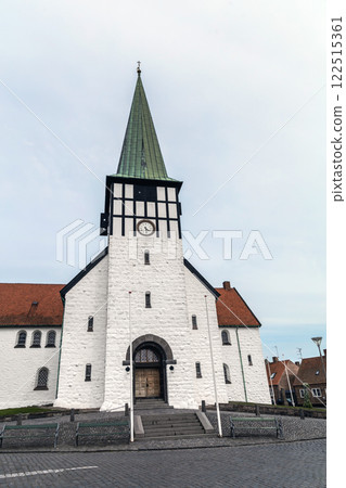 Ancient street and the white church of the city of Ronne, Bornholm Island, Denmark Ancient street and the white church of the city of Ronne, Bornholm Island, Denmark 122515361