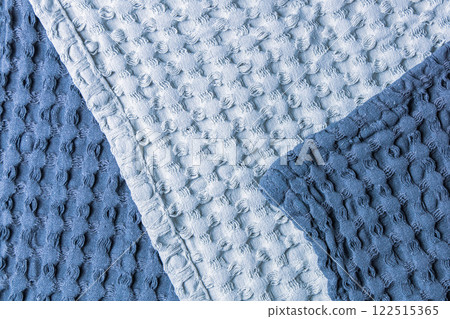 Textile background soft textured cotton fabric in blue tones 122515365