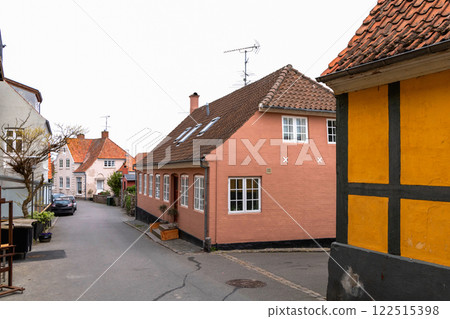 Traditional old residential houses with tiled roofs on the island of Bornholm, Denmark Traditional old residential houses with tiled roofs on the island of Bornholm, Denmark 122515398