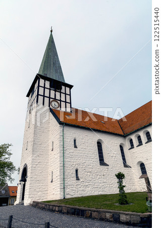 Ancient street and the white church of the city of Ronne, Bornholm Island, Denmark Ancient street and the white church of the city of Ronne, Bornholm Island, Denmark 122515440