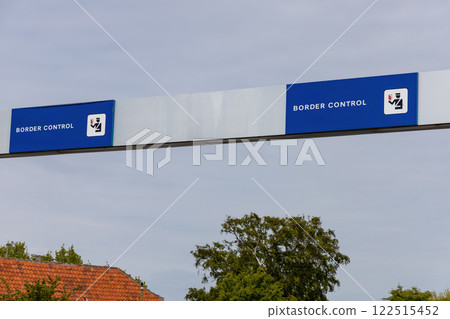 Sign in three languages Danish, English and German - Border control. Sign in three languages Danish, English and German - Border control. 122515452