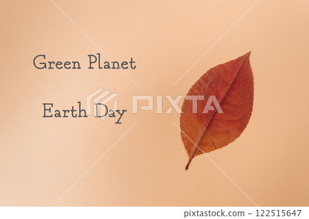 Leaf is on a white background with the words Green Planet Earth Day Leaf is on a white background with the words Green Planet Earth Day 122515647